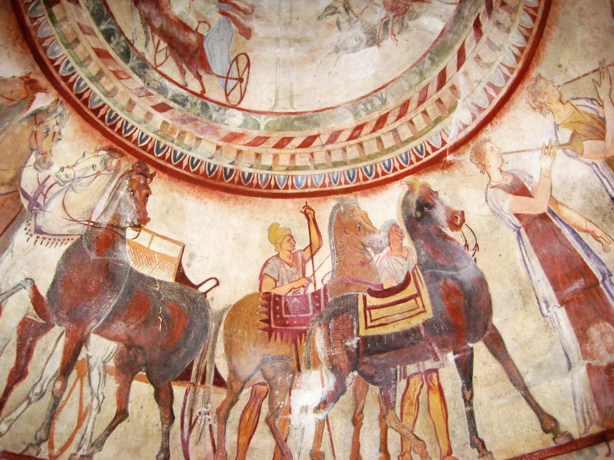 Ancient Thracian mural depicting horse-drawn chariots and figures in a traditional fresco style, representing the historical heritage of Bulgaria.